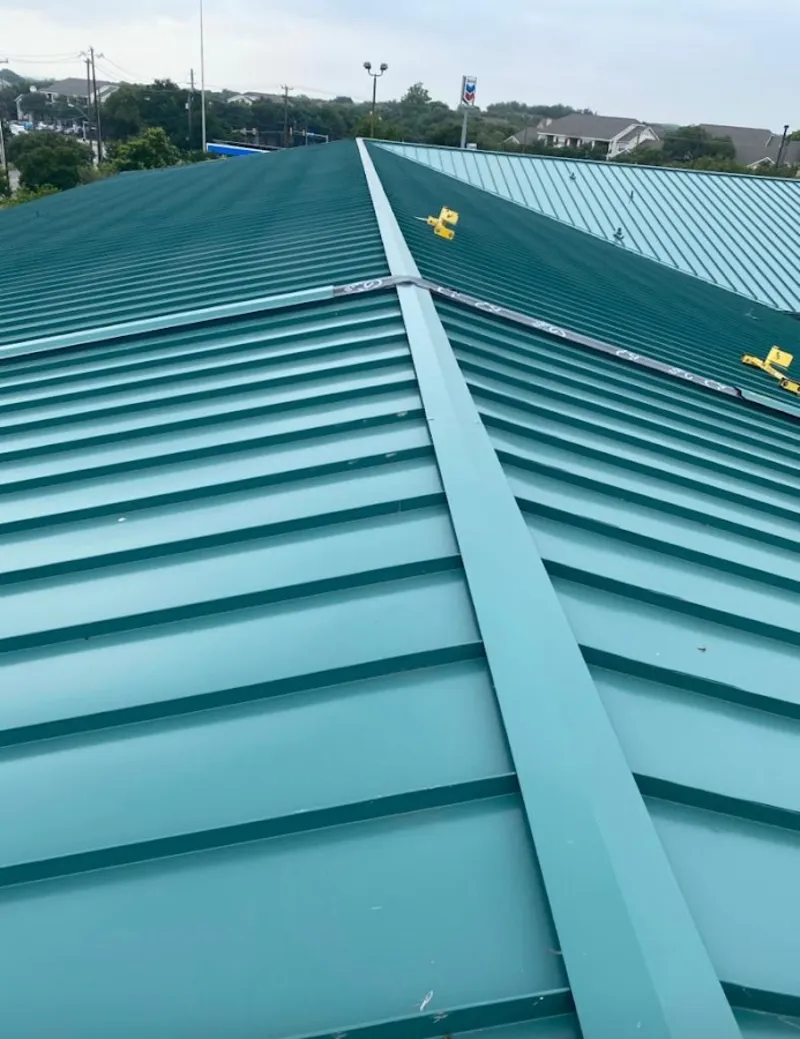 Green commercial metal roof ridge and valley for Metal Roof Repair in Alvarado