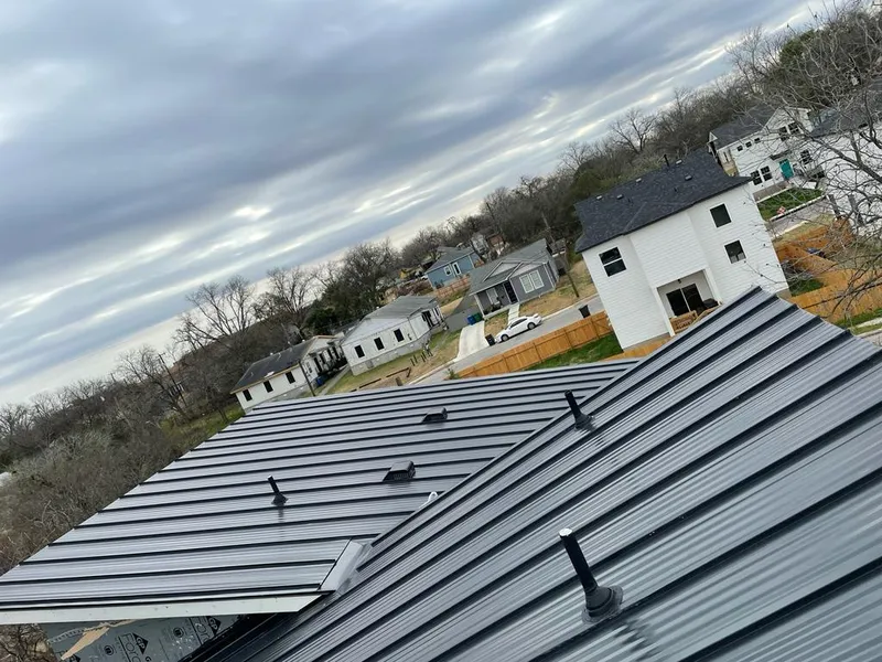 Standing seam metal roof panels with vents for Skylight Repair in Alvarado